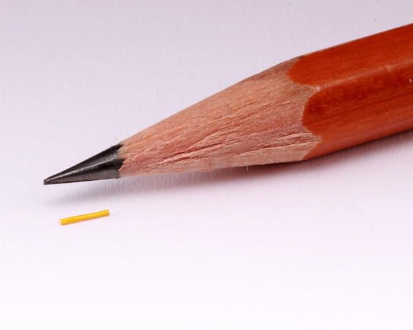Medidur next to pencil tip