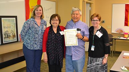 Pictured: Young Hak Ahn (second from right) accepts a certificate of appreciation from College of DuPage’s Field Studies/Study Abroad office alongside COD language instructors (from left) Spanish professor Donna Gillespie, French and Italian professor Mirta Pagnucci, and German professor Bärbel Thoens-Masghati, who all taught Ahn.

