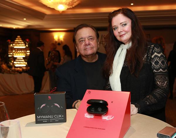 Paul Sorvino and DeeDee Sorvino with the new MyManu Clik translating device at the GBK Pre-Golden Globes lounge in Beverly Hills. 