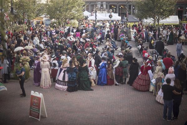 Costumers by the hundreds prepare for the crowd favorite costume contests at the 44th annual Dickens on The Strand festival in Galveston, Texas. 