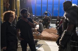 Carter (left) on set with Black Panther Director Ryan Coogler (middle) and actor Winston Duke (right) discuss the costume of M’Baku. (Marvel)