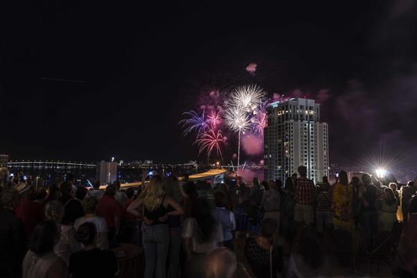 Guests enjoying the fireworks from the 10th floor terrace of the Fort Harrison.jpg