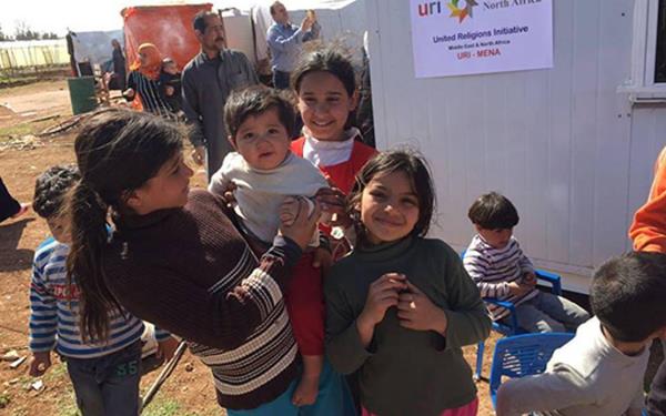 URI members from the Middle East and North Africa region regularly visit Syrian refugees, bringing supplies for the families and educational opportunities for the children, who have to grow up in a refugee camp instead of going to school. Under the travel ban, most Syrians will not be able to enter the US.