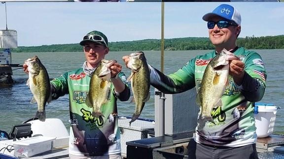 Benjamin Seaman '19, of Colchester, Vt. (left) and Tyler Robinson '19, of Waddington, NY display four bass after taking second place in the New York State Qualifier for the Bassmasters National Collegiate Championship this past summer.   