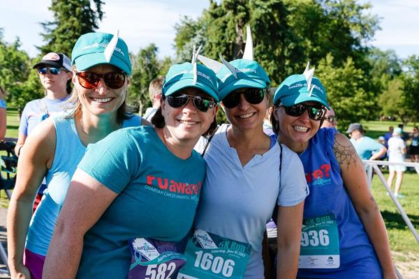Erin Elston (in teal) with Ovasaurus Rex team members celebrate at the 2017 Jodi’s Race for Awareness.