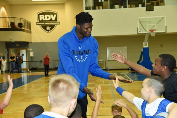 Orlando Magic rookie Mo Bamba surprised kids at the Magic Youth Academy Basketball Camp presented by UnitedHealthcare on Wednesday, Aug. 1 at the RDV Sportsplex. The center ran drills with campers, participated in a Q&A session, took photos and signed autographs for the youth in attendance. 

Courtesy: Gary Bassing, Orlando Magic