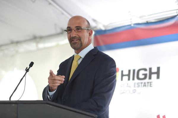 Mark Fitzgerald, President and COO, High Real Estate Group LLC and President of Penn Square Partners, welcomes about 90 guests to the topping-off ceremony signifying the structural completion of the East Tower of the Lancaster Marriott at Penn Square in downtown Lancaster on Tuesday, August 7, 2018. Slated to open in spring 2019, the expansion adds 110 convention-quality rooms needed to attract larger events to the integrated facility.