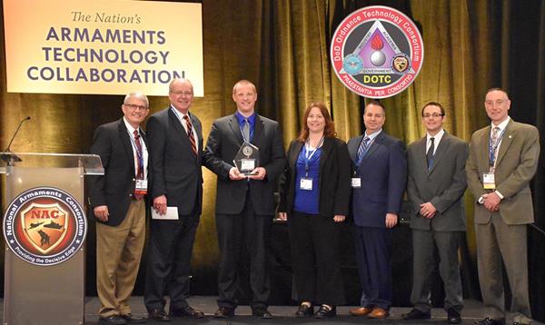 Pictured at the award ceremony are Charlie Zisette, NAC Executive Director; from CTC - Ed Sheehan, Todd Skowron, Lori Denault, Gino Spinos, and Shawn Rhodes; and Donald Geiss, DOTC Program Director.