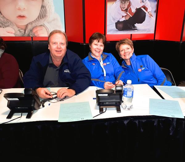 Minuteman Press franchise Co-Owner Andre Martin (left) at the 2018 Scotties Tournament of Hearts Canada Curling Championships. www,minutemanpress.ca