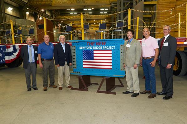 High Steel Structures LLC celebrates fabrication of its final steel girder for the New NY Bridge - the Governor Mario M. Cuomo Bridge - at its Williamsport, Pa. plant. High fabricated 50,000 tons of steel for the project at its facilities in Williamsport and Lancaster, Pa. It is the largest project in the company's history and the largest design-build transportation infrastructure project in the United States. Pictured left to right are: Ronnie Medlock, VP Technical Services, High Steel Structures; Jeff Wheeland, Lycoming County Commissioner; Gene Yaw, Pa. State Representative; Dr. Gabe Campana, Mayor of Williamsport; Tom Marino, US Congressman; Jeff Sterner, President and COO, High Industries Inc.