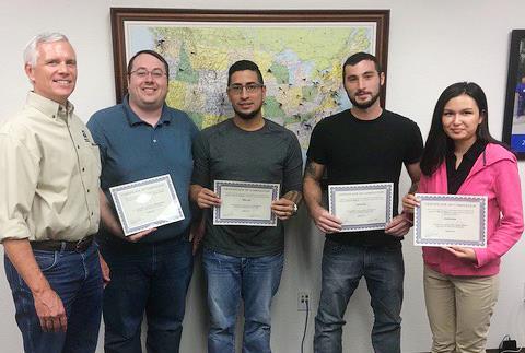 Miracle Method President Chuck Pistor presents certificates of completion to Miracle Method of Houston NE's team. From Left to Right: Miracle Method President Chuck Pistor, Owner Roy Hall, Technician Jeffrey Ayala, Technician Derek Burleson and Front Office Umida Rasuleva.