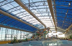 The largest indoor water park under a single curved  retractable roof in the USA.
