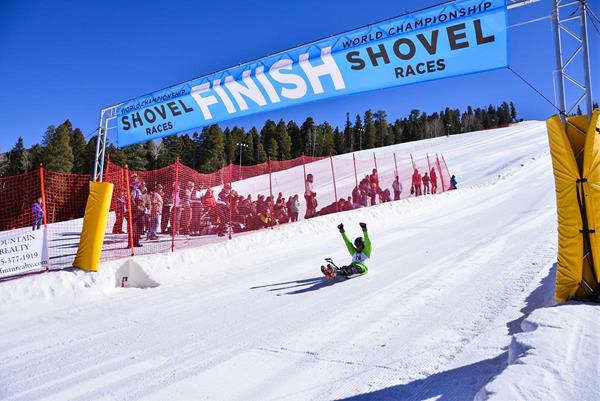 Crossing the finish line at the 39th Annual World Championship Shovel Races at Angel Fire Resort. Angel Fire, New Mexico.