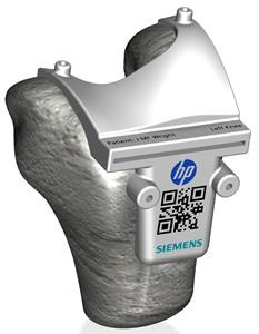 Color 3D printed surgical guide made possible by Siemens design software and HP Multi Jet Fusion.