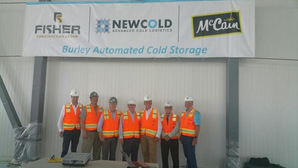 Group photo of NewCold, McCain, Fisher Construction Group and State of Idaho leadership. Pictured right to left: Scott Bedke, Doug Manning, Governor C.L. "Butch" Otter, Dale McCarthy, David Richardson, Dan Powers, and Jonas Swarttouw.
