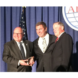 Bob Chisholm receives award from AFCEA International.