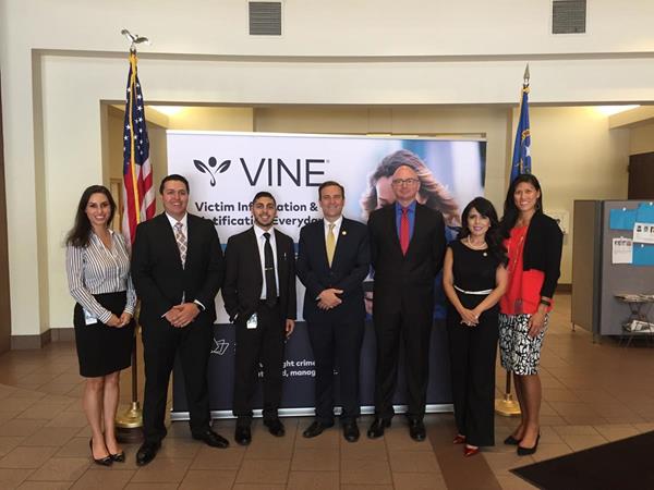 Gathered to announce the launch of the enhanced VINE service in Nevada, are (L to R): Monica Moazez, Communications Director, Office of the Attorney General, State of Nevada; Jon Turl, Client Relationship Manager, Appriss Safety; Jason Mouannes, Administrative Assistant to Arlene Rivera; Adam Paul Laxalt, Attorney General, State of Nevada; Josh Bruner, President, Appriss Safety; Arlene Rivera, Ombudsman, Office of the Attorney General, State of Nevada; Krisy Bucher, Marketing Manager, Appriss Safety.
