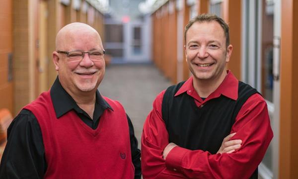 CUAA Haab School of Business professors Dan Chlebos (left) and Frank Rubino (right) share a combined 64 years of experience in law enforcement. 