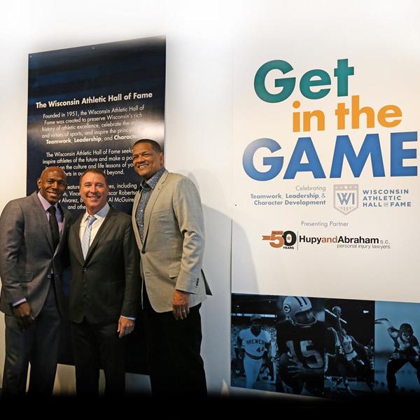 Attorney Abraham with Donald Driver and Marques Johnson at the "Get in the Game" Exhibit. 