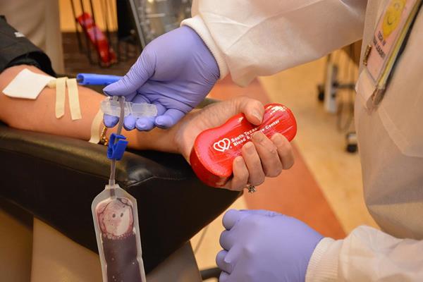 Blood is drawn for testing during a blood donation at the South Texas Blood & Tissue Center.