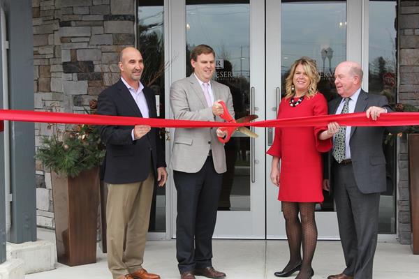 Ribbon cutting for The Reserve at Greenfield, Lancaster, Pa. Pictured left to right: Mark Fitzgerald, President and COO, High Real Estate Group LLC; Brad Mowbray, Senior Vice President & Managing Director - Residential Division, High Associates Ltd.; Tina McGinnis, Regional Manager, High Associates Ltd.; Rick Stoudt, President, High Construction Company.