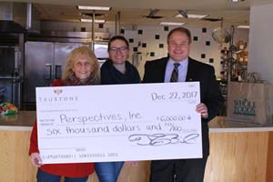 TruStone Financial CEO Tim Bosiacki presented the donation to Perspectives, Inc.