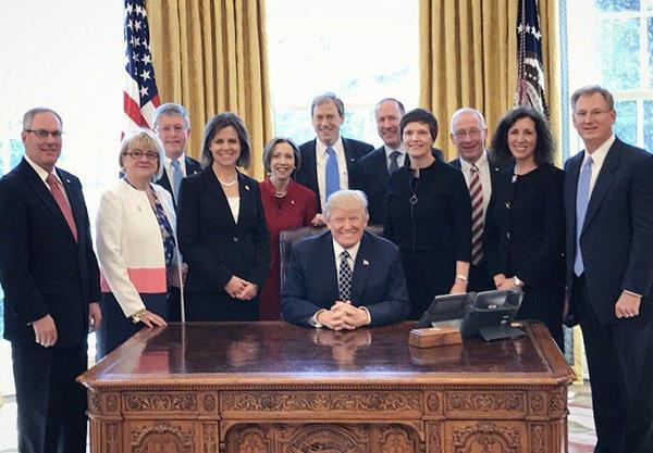 Laurie Oval Office (white jacket)