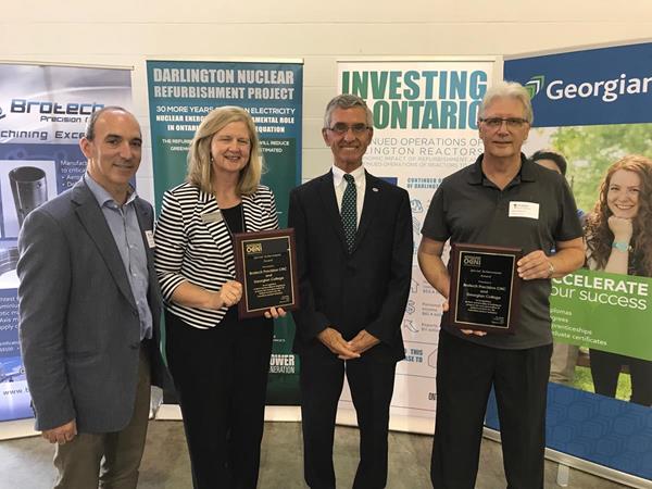 Ron Oberth presenting OCNI Special Achievement Awards to Brian Wetherall, President of Brotech Precision CNC and MaryLynn West-Moynes President of Georgian College in recognition of their partnership in helping to prepare the next generation of skilled workers for the Canadian nuclear industry.