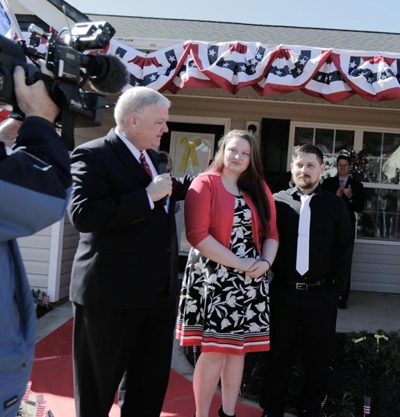 Freedom Alliance President Tom Kilgannon presented a mortgage-free home in medically retired Army Sgt. Aaron Hillis in Boiling Springs on Friday, March 2. Hillis is pictured with wife Elizabeth. 