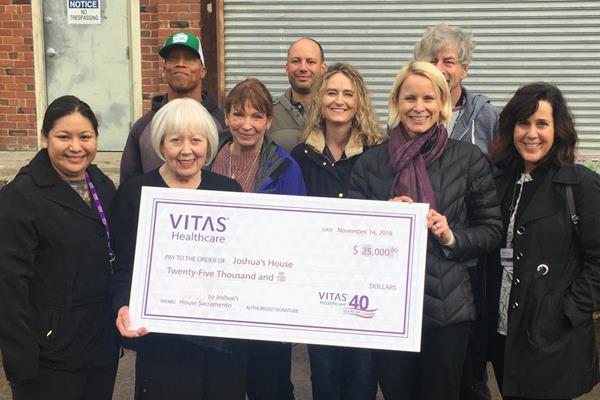 VITAS Healthcare of Sacramento presents a $25,000 gift in support of Joshua's House. 

Pictured from left: (front) Kristin Antonio, Marlene von Friederichs-Fitzwater, Lena Nilsson, Janine Siegel; (second row) Pamela Mello Dennis, Amy Harris; (back) John Brown, Justin Sayklay, and John B. Gay.