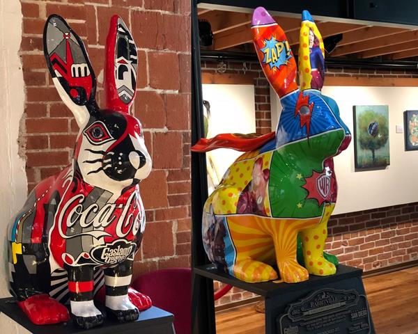 Sponsored Rabbits of "Rabbitville"  The Coca-Cola Rabbit by Artist Steven Van.  Warner Bros Television Rabbit titled "Hop Hop and Away" by Warner Bros.Television Marketing Division.

photo credit: Michael Trimble