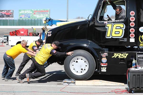 “The Bandit track crew helps move the #16 truck off its blocks at Motor Mile Speedway on Saturday, April 21st.”