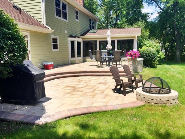 Archadeck of Chicagoland's award winning project in the hardscape category is a spacious, multi-level Belgard paver patio. The patio's different levels create defined spaces for multiple functions such as dining, lounging, seating around a fire pit and grilling. 