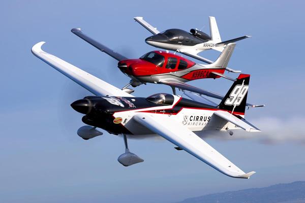 Cirrus Aircraft's SR22T and Vision® Jet flying high with Cirrus Ambassador, owner and pilot, Mike Goulian of Red Bull Air Race Team 99.