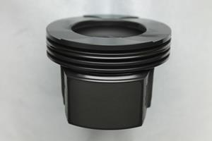 Passenger car steel piston with the new Federal-Mogul Powertrain EcoTough-D skirt coating for diesel applications.JPG