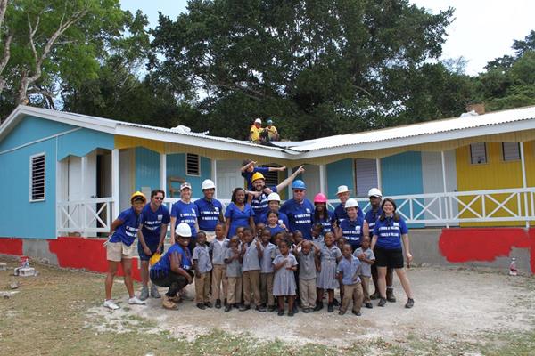 Canadian Volunteers of Food For The Poor Canada working in Jamaica to build a school.