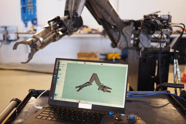 Olis operating system controlling a robotic arm 