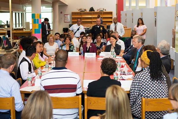 Governor Charlie Baker along with Board Members from The Richard and Susan Smith Family Foundation see firsthand the impact of Early College at Chelsea High School.