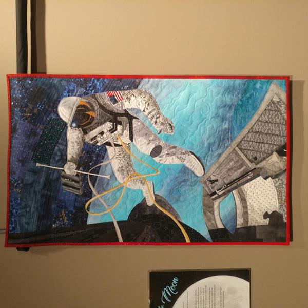 Quilt entitled "Ed White" by artist Margaret Williams.  Ed White was the first man to walk in space.  