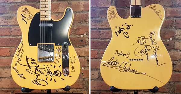 Charity Auction Item: Guitar autographed by Bruce Springsteen and all members of the E Street Band: Nils Lofgren, Roy Bittan, Jake Clemons, Charles Giordano, Patti Scialfa, Garry Tallent, Soozie Tyrell, Stevie Van Zandt, and Max Weinberg.  The autographed guitar is packaged with two tickets -- center orchestra, second row -- to SPRINGSTEEN ON BROADWAY, Bruce Springsteen’s sold-out, one-man show at the Walter Kerr Theater in New York City.