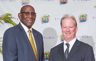 University of the Virgin Islands President, Dr. David Hall, and Richard Berry, President of TOPA Equities VI pose for a photo after Check Presentation.