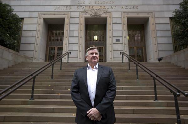 Leif Hansen stands in front of the Gus J. Solomon United States Courthouse in Portland, Oregon.