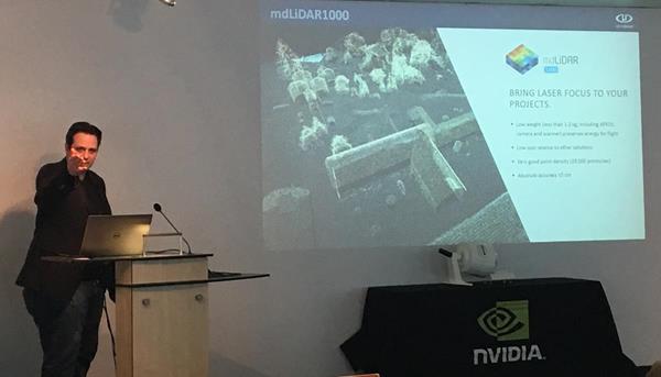 Pictured: Sven Juerss of Microdrones holds a presentation on the mdLiDAR1000