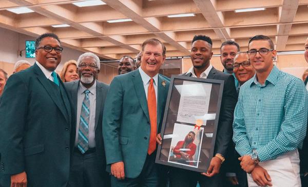 Mike Rawlings, The Mayor of Dallas recognizes Dorrough Music for his philanthropic work and community involvement with his own "Dorrough Day" and keys to the city.

