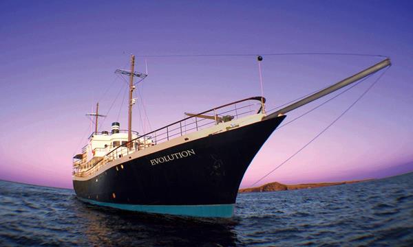 IE Galapagos guests explore aboard the 32-guest yacht MV Evolution. 