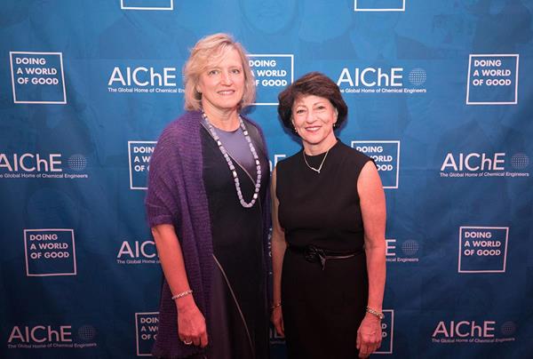 From left: June Wispelwey, AIChE's Executive Director and Chief Executive Officer, congratulates Doing a World of Good Medal recipient Nance Dicciani, Founder, President, and Chief Executive Officer of RTM Vital Signs LLC. Photo credit: Hassan Mokaddam, HMPhotoshoots