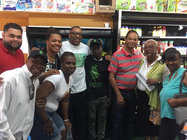 Members of Richard Allen New Generation (RANG), a community nonprofit organization which was recently designated as a Registered Community Organization (RCO) by the Philadelphia City Planning Commission, have partnered with Polo Supermarket, located at 10th and Brown Streets, to have the store hire Shareem Thorpe (sixth from left), a rising freshman at Benjamin Franklin High School, as part of a community agreement put in place in late April. Pictured here are Anthony Jimenez (far left), owner, Polo Supermarket; Anita Boyd (third form left), vice president, RANG; Bernard Gorham (fifth from left), president, RANG; and other officers and members of RANG’s board. 