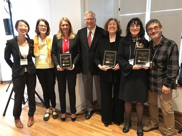 The winners of the Innovation@Home age-friendly housing contest are acknowledged at the 2018 International Technical Meeting on Ageing at Home, in Québec City, Canada, October 22, 2018. The contest was co-sponsored by Grantmakers In Aging (GIA) and the World Health Organization’s Global Network for Age-Friendly Cities and Communities. (L. to R.: Diane Wu, WHO Department of Ageing and Life Course; Jenny Campbell, GIA consultant; Raquel Castelo Branco, Aconchego Program, Porto, Portugal; John Feather, CEO, Grantmakers In Aging (GIA); Sybil Boutilier, Chair, Age Friendly Sausalito; Yolanda Moragues Casabon and Joan Vidal, Home Refurbishment Program in the Barcelona Province, Spain.)