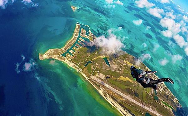 Skydivers over West End, Grand Bahama Island, Bahamas 
(Image courtesy of Jeff Root).