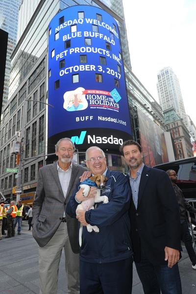 Blue Buffalo Founder Bill Bishop, Helen Woodward President & CEO Mike Arms, and Blue Buffalo CEO Billy Bishop at the Nasdaq Opening Bell Celebration for Home 4 the Holidays.